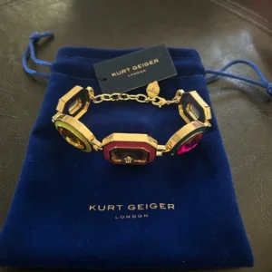 Kurt Geiger Goldtone Bracelet With Pink Green And Purple Stones